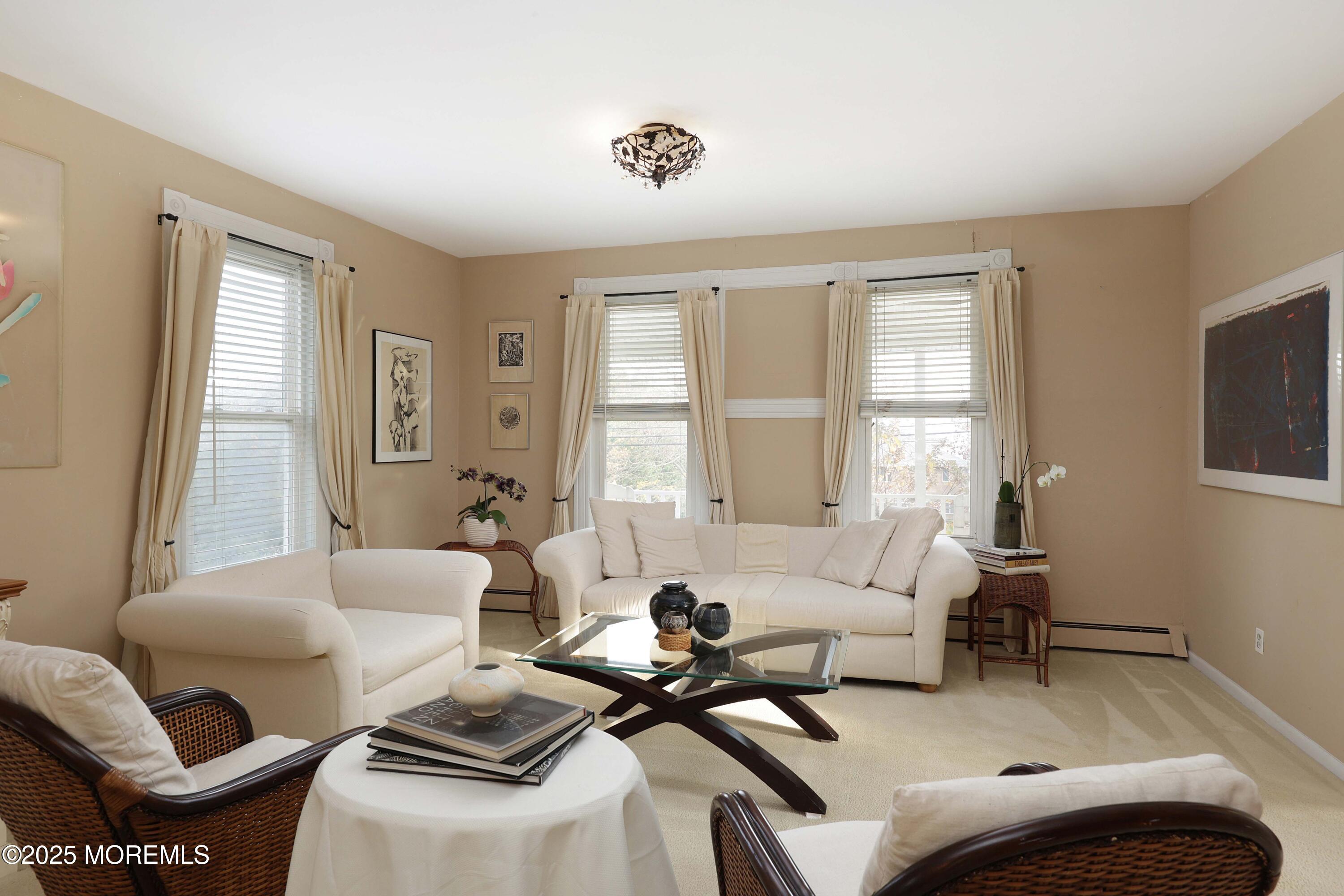75 Portland Road Highlands, NJ 07732 - Photo 9 of 56 a living room with furniture and a window