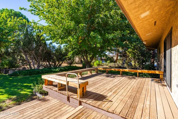 a view of a house with a tree