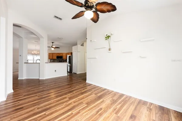 a view of a kitchen from the hallway