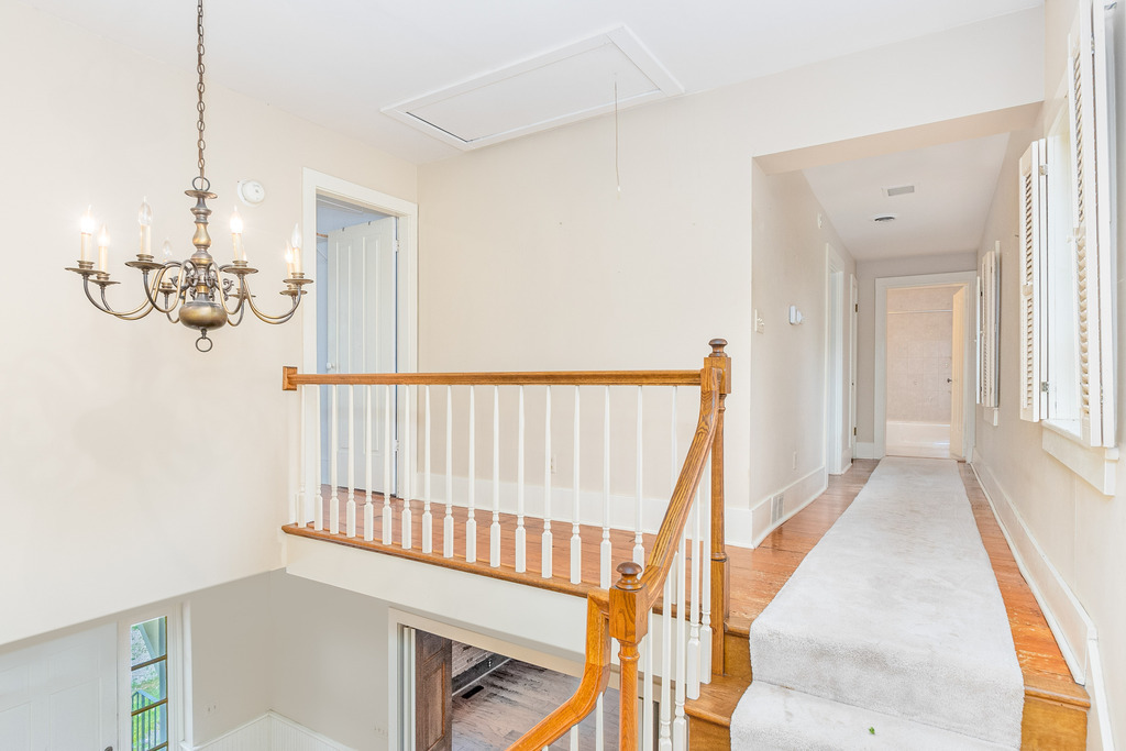 16071 Walker Road Newark, IL 60541 - Photo 18 of 41 workspace with wooden floor windows and stairs