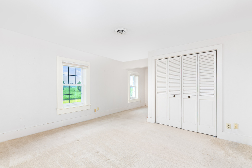 16071 Walker Road Newark, IL 60541 - Photo 20 of 41 an empty room with windows and closet