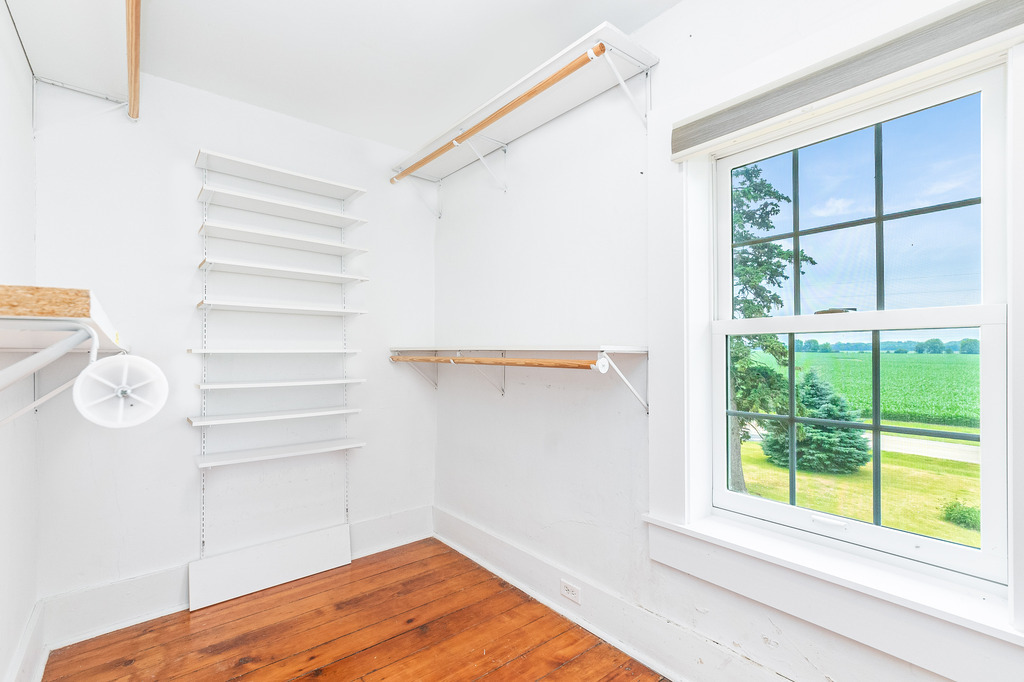 16071 Walker Road Newark, IL 60541 - Photo 24 of 41 a view of a room that has a window and wooden floor