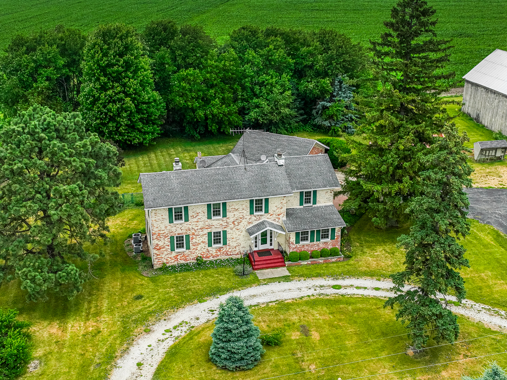 16071 Walker Road Newark, IL 60541 - Photo 4 of 41 a aerial view of a house with swimming pool next to a big yard