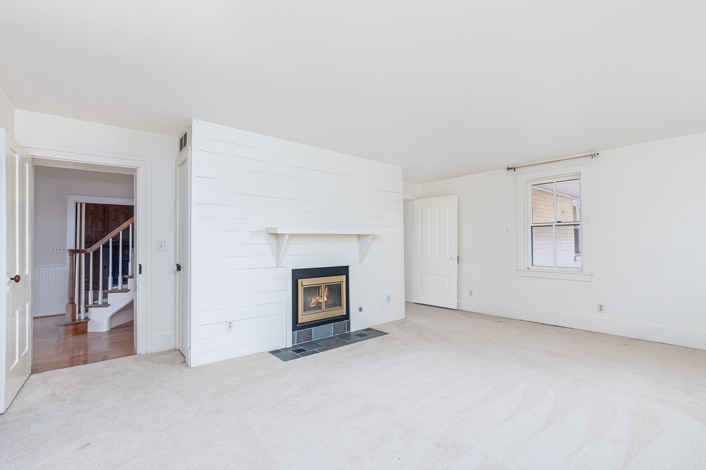 16071 Walker Road Newark, IL 60541 - Photo 8 of 41 an empty room with fireplace