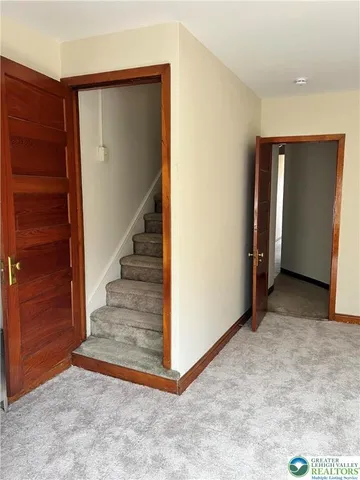 a view of entryway with stairs