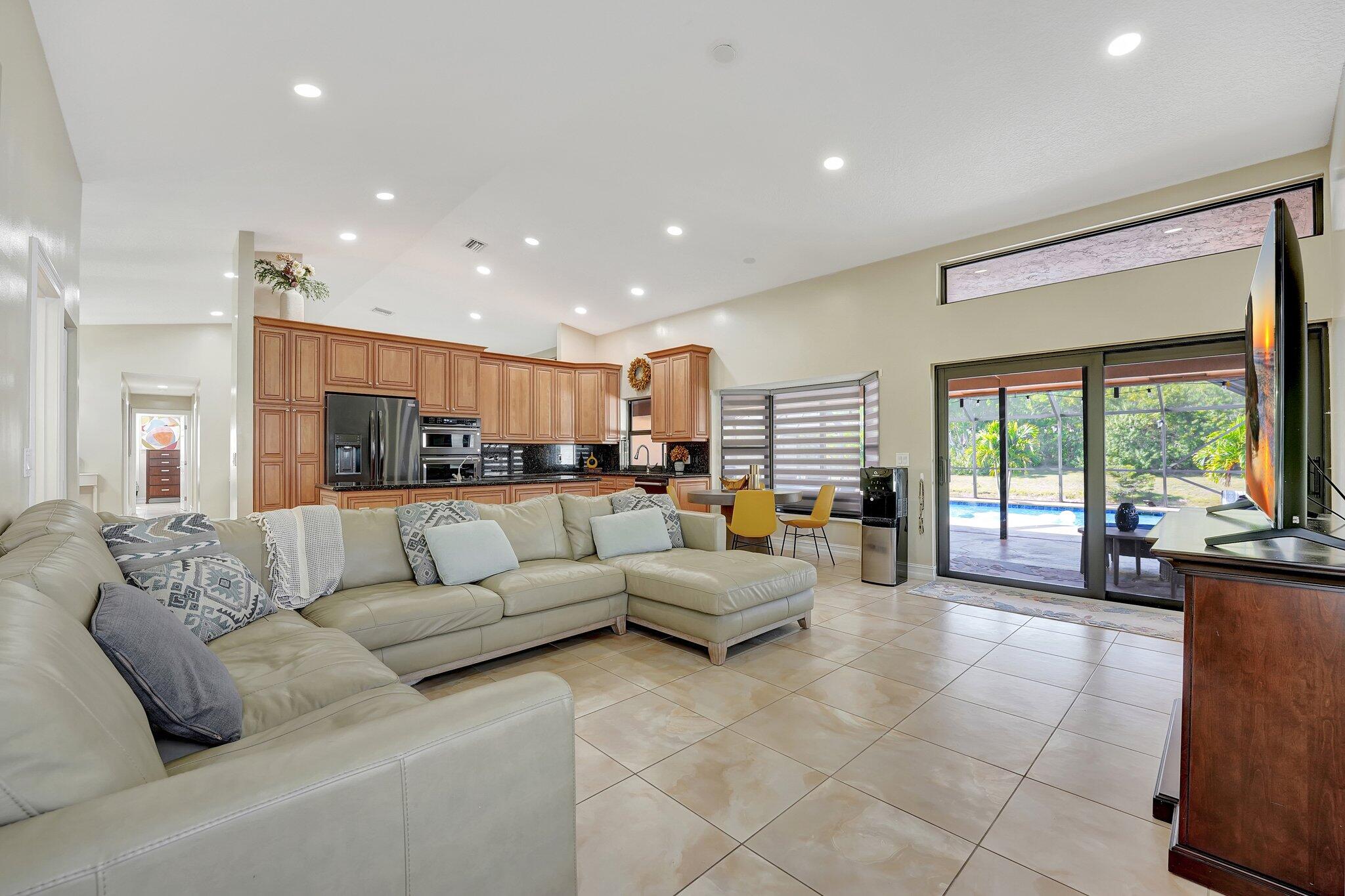11660 Island Lakes Lane Boca Raton, FL 33498 - Photo 15 of 68 Open Kitchen and Family Room