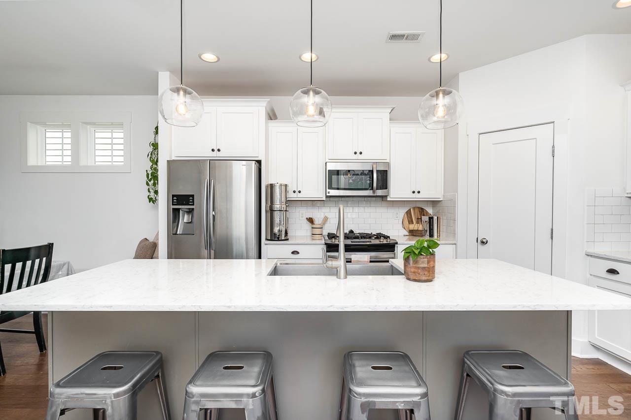 433 Daniel Ridge Rd. Wendell, NC 27591 - Photo 5 of 16 Features Stainless Steel appliances and large pantry