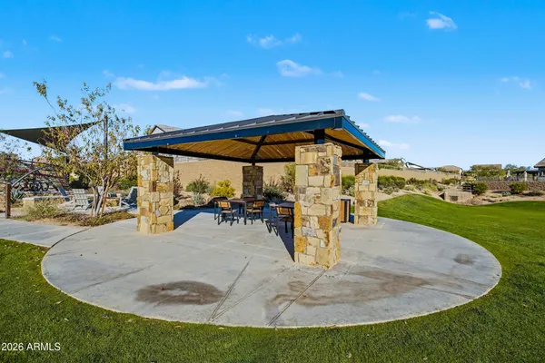 a view of a street with sitting area
