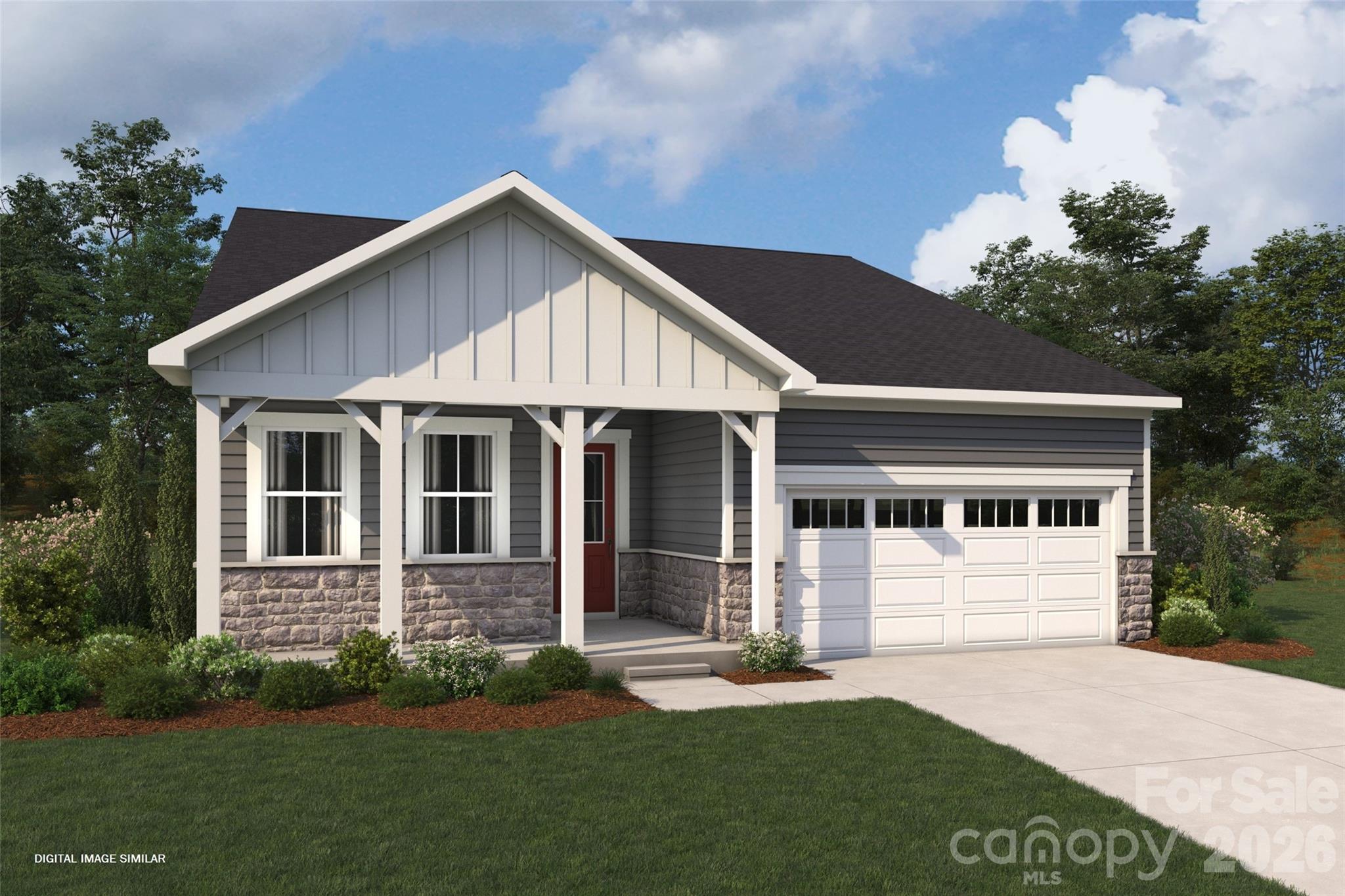 1456 McCollum Street Monroe, NC 28112 - Photo 1 of 29 a front view of a house with a yard and garage