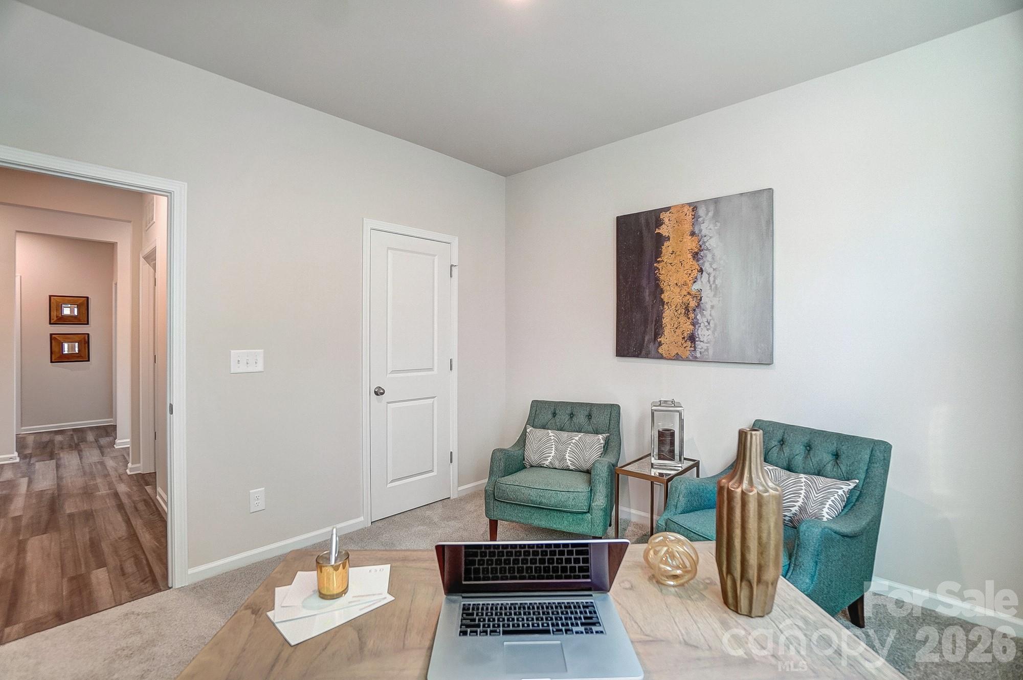 1456 McCollum Street Monroe, NC 28112 - Photo 23 of 29 a living room with furniture and wooden floor