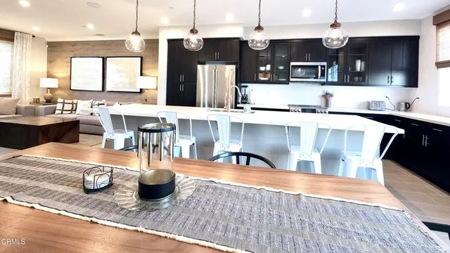 a bathroom with a shower sink double vanity and mirror