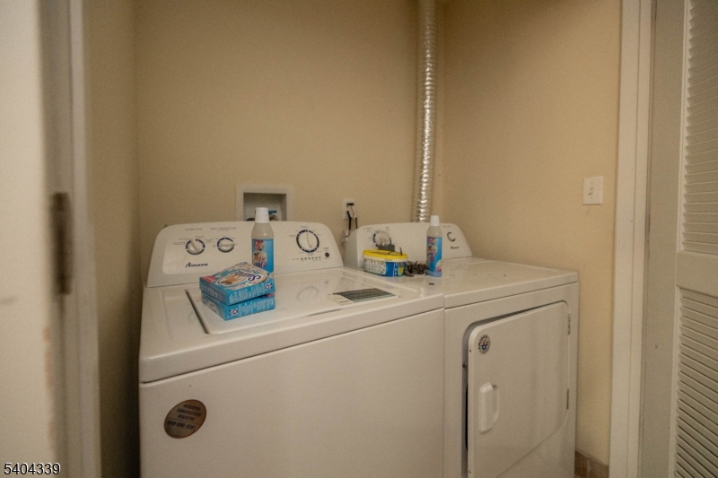 307 Pearl Street Elizabeth, NJ 07202 - Photo 6 of 13 a utility room with dryer and washer