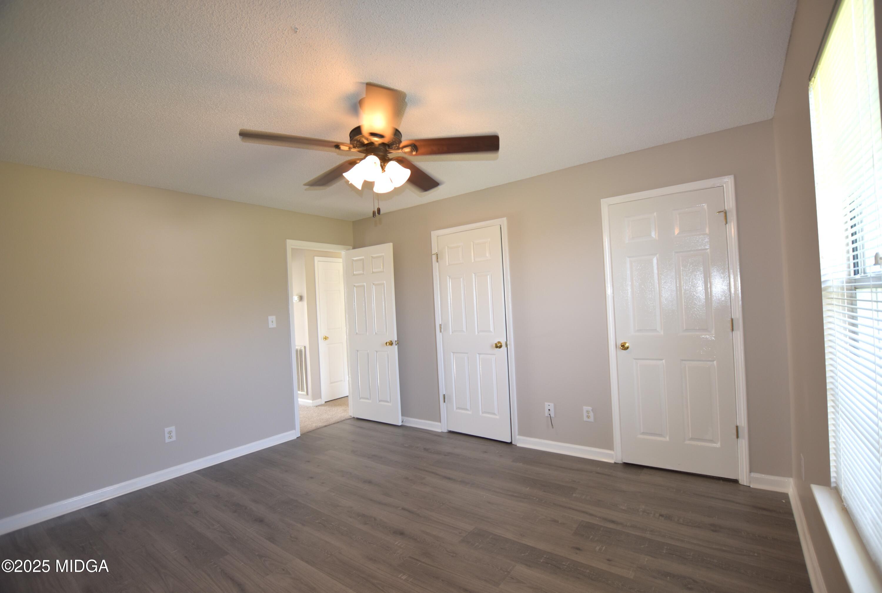 6550 Skipper Road Macon, GA 31216 - Photo 18 of 35 a view of an empty room and window