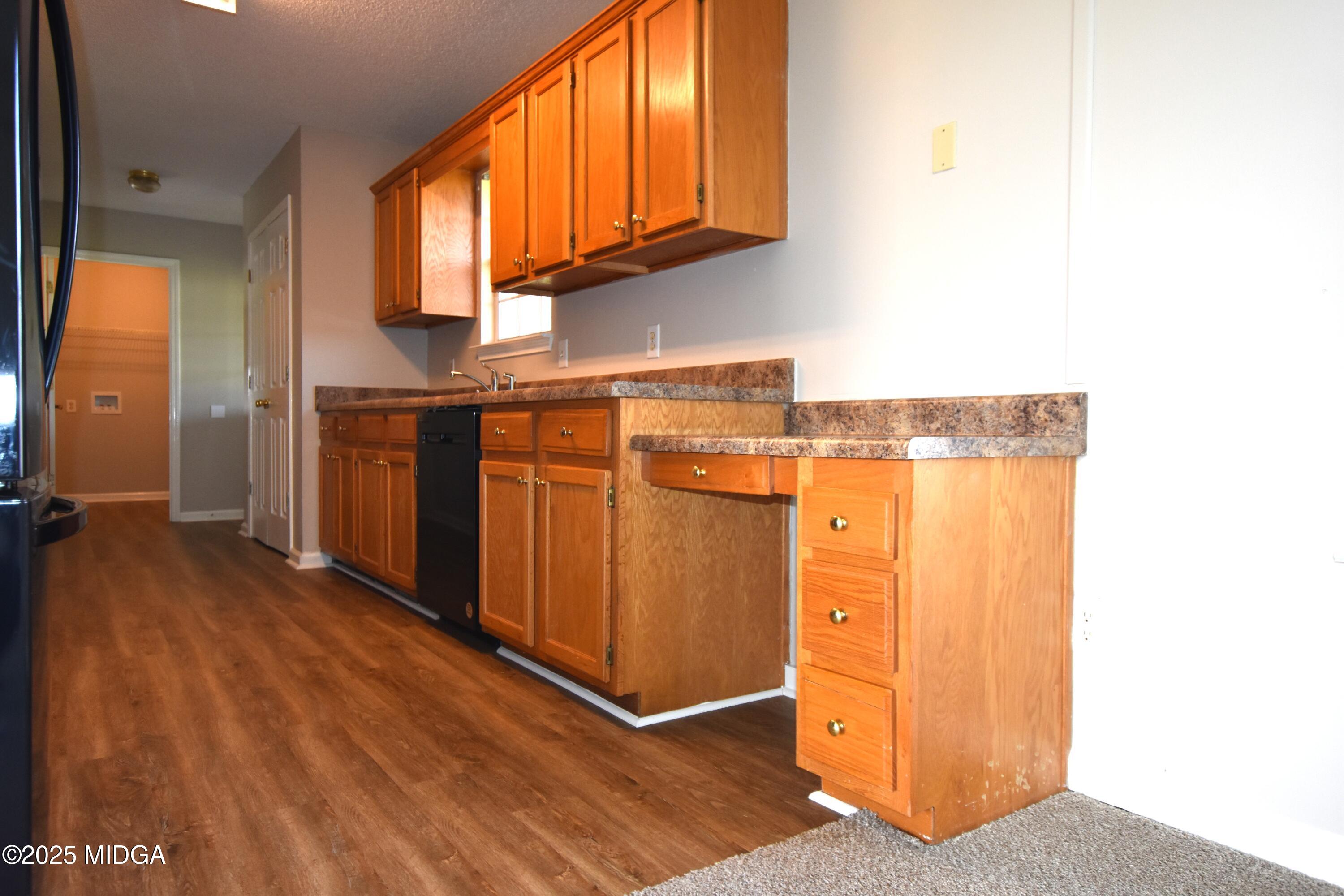 6550 Skipper Road Macon, GA 31216 - Photo 29 of 35 a view of a kitchen with a sink