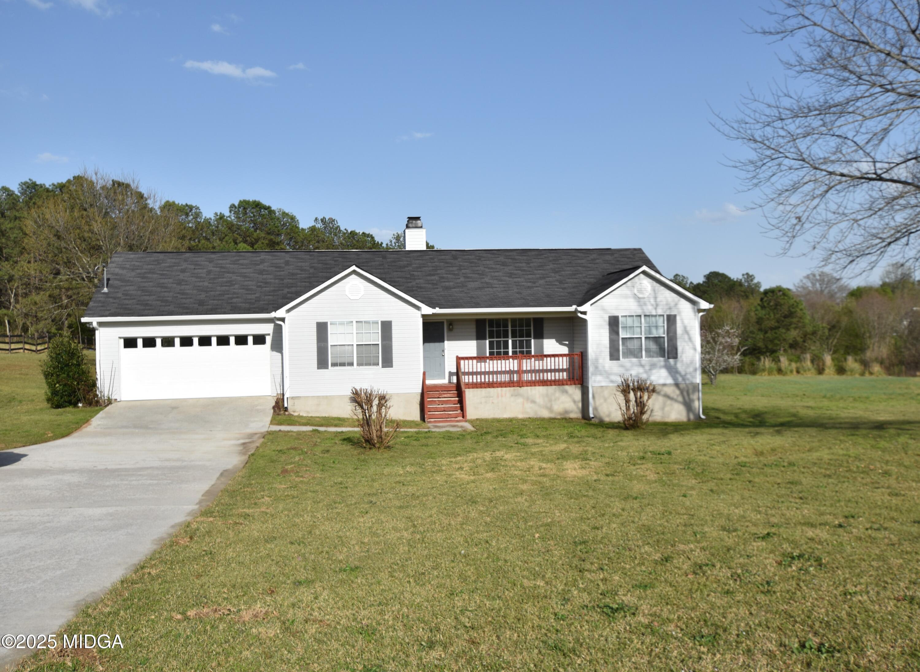 6550 Skipper Road Macon, GA 31216 - Photo 3 of 35 a house view with a outdoor space