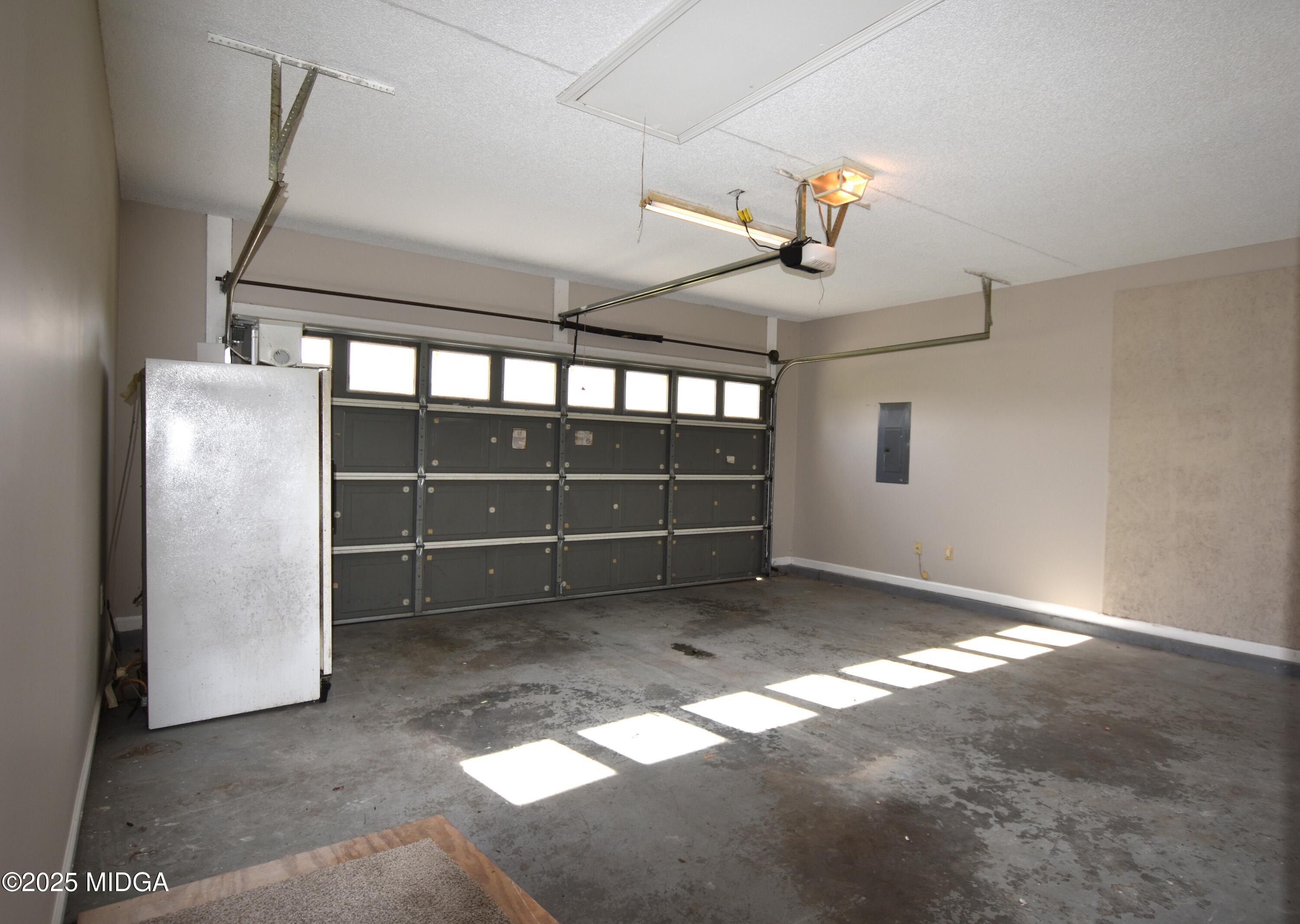 6550 Skipper Road Macon, GA 31216 - Photo 33 of 35 a view of a livingroom with a ceiling fan and window