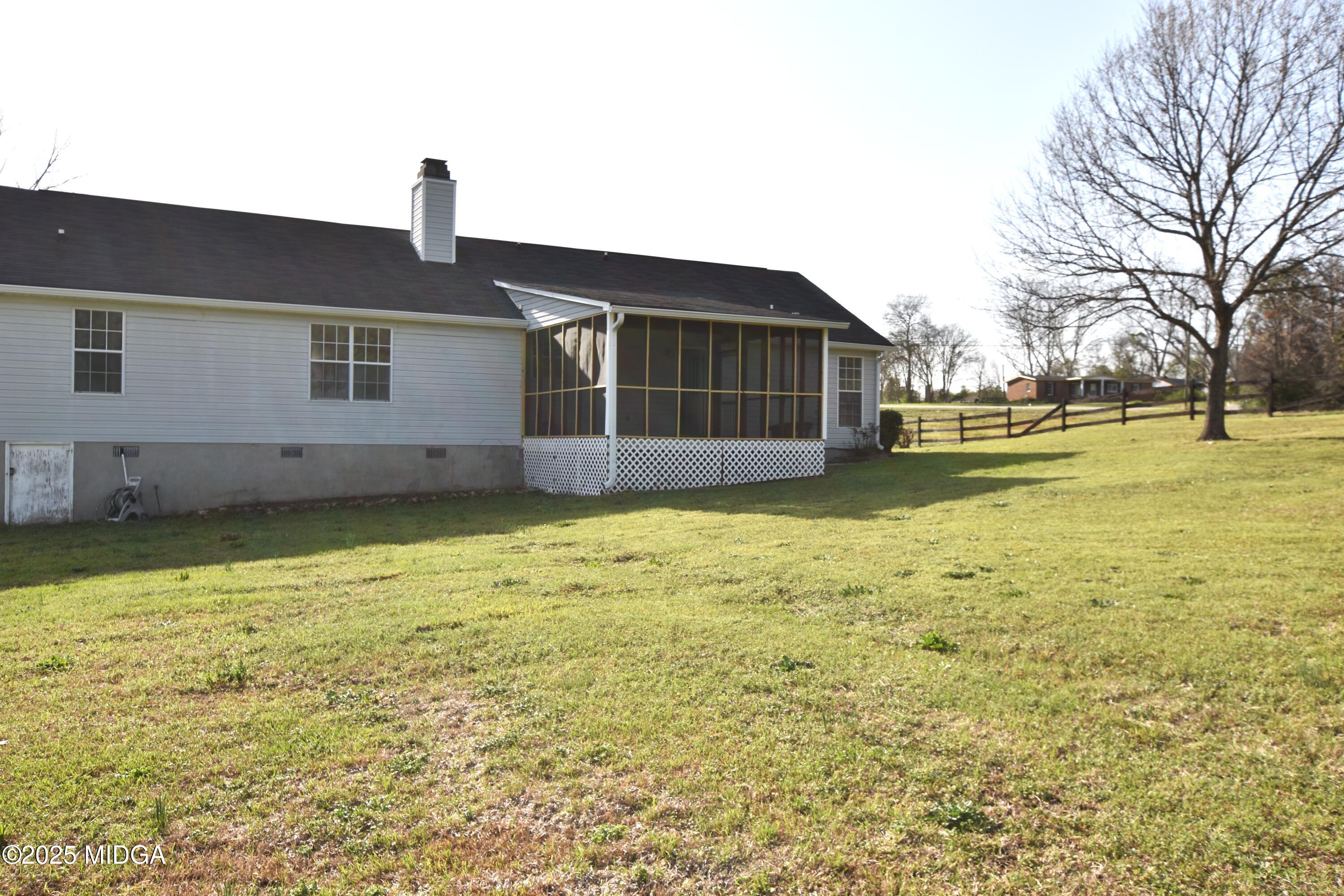 6550 Skipper Road Macon, GA 31216 - Photo 6 of 35 a house view with a ocean view