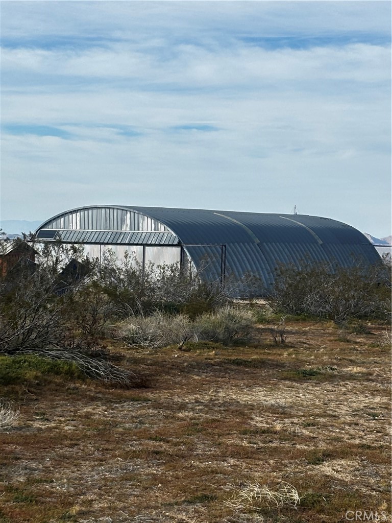 0 223rd Llano, CA 93544 - Photo 2 of 11 a view of a swimming pool with a house
