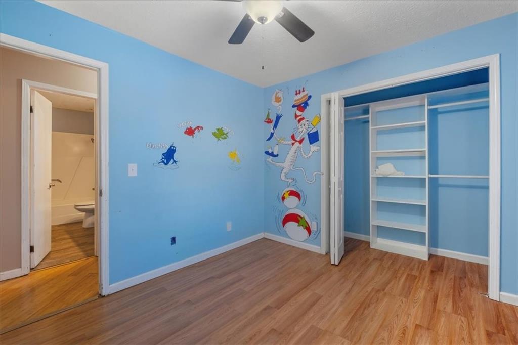 95 Cash Town Road Aragon, GA 30104 - Photo 16 of 22 a room with toys and wooden floor