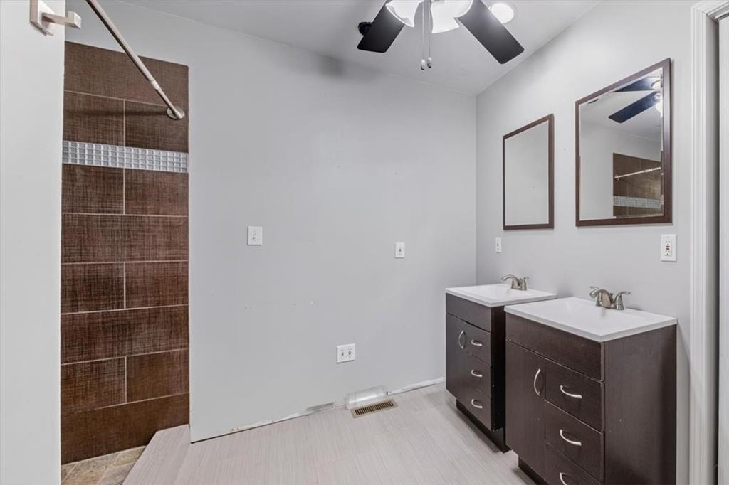 95 Cash Town Road Aragon, GA 30104 - Photo 20 of 22 a bathroom with a double vanity sink mirror and