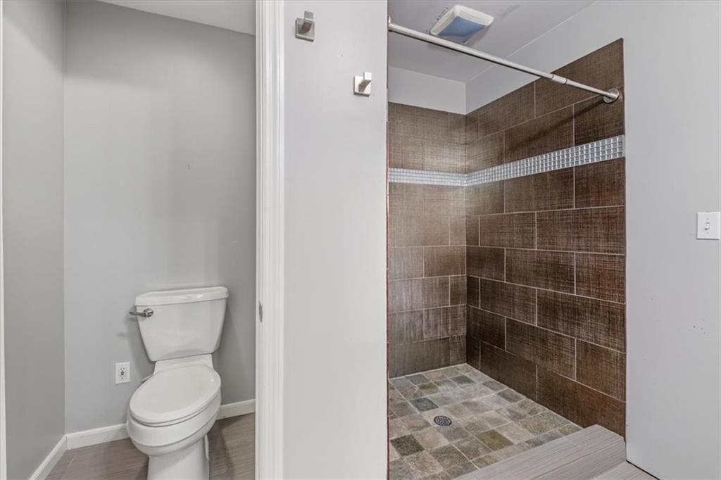 95 Cash Town Road Aragon, GA 30104 - Photo 22 of 22 a bathroom with a toilet and a shower