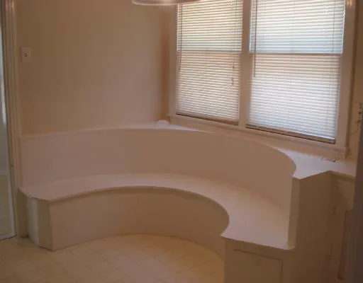 a view of a small space with windows