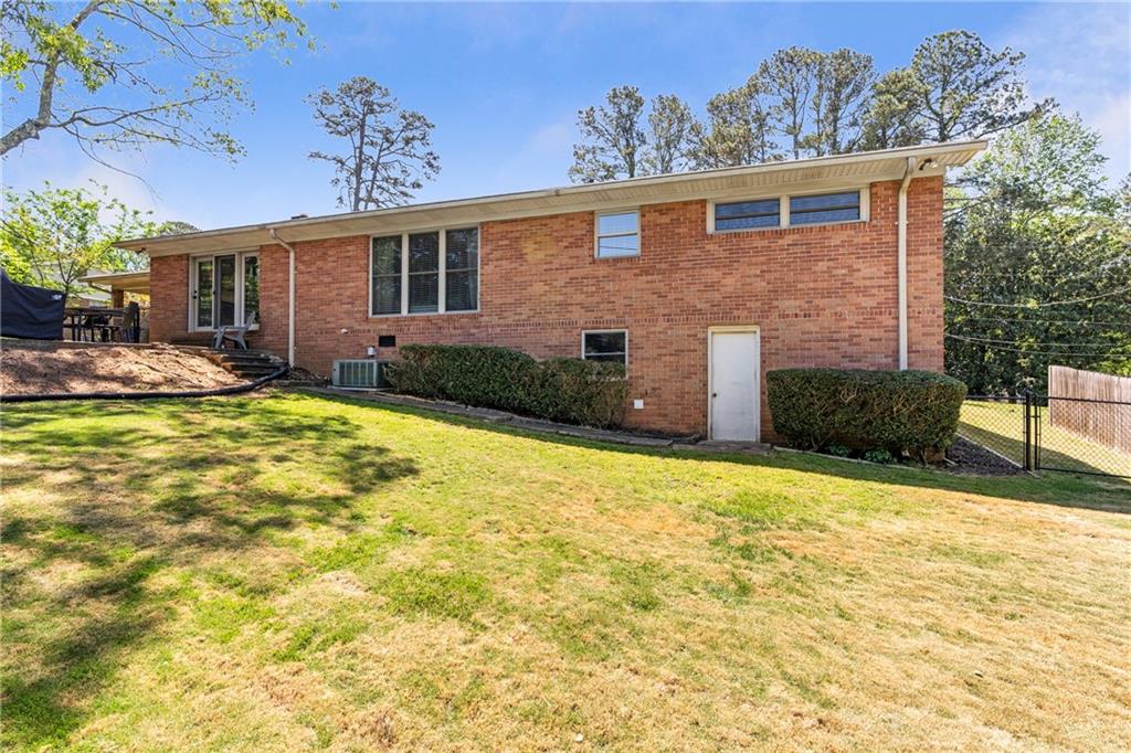 2037 Pinetree Trail Gainesville, GA 30501 - Photo 35 of 35 a front view of a house with a yard