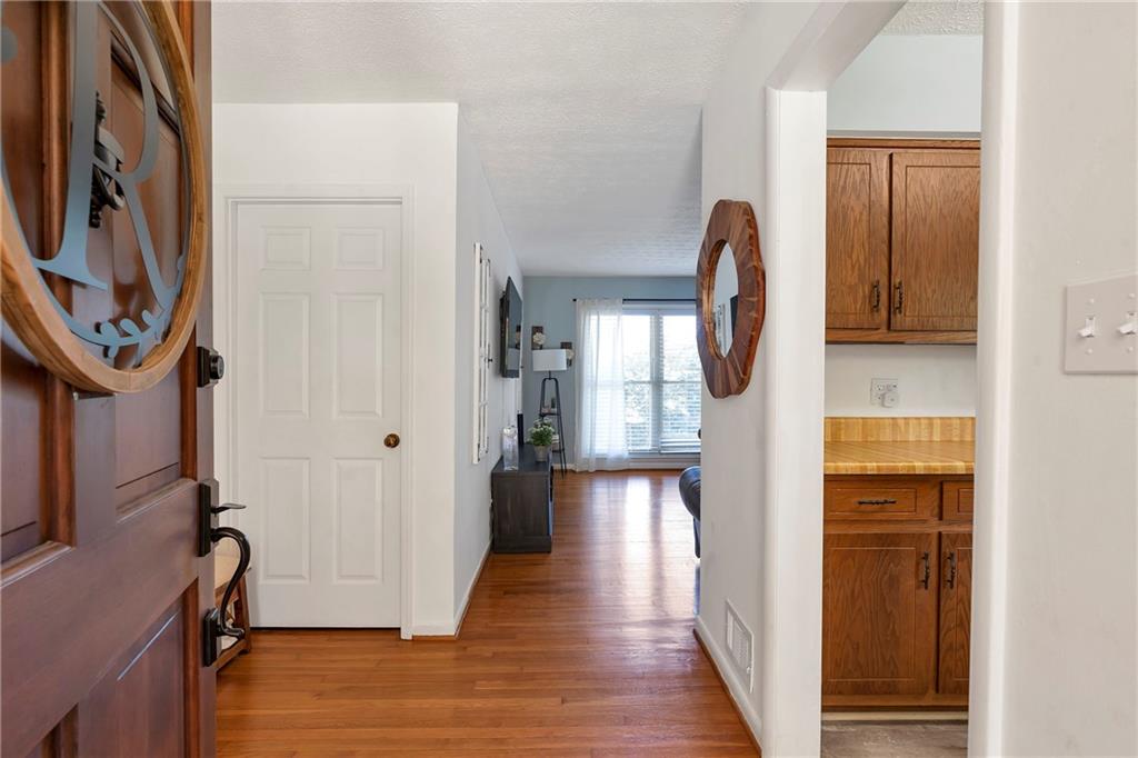 2037 Pinetree Trail Gainesville, GA 30501 - Photo 5 of 35 a view of a entryway door with wooden floor