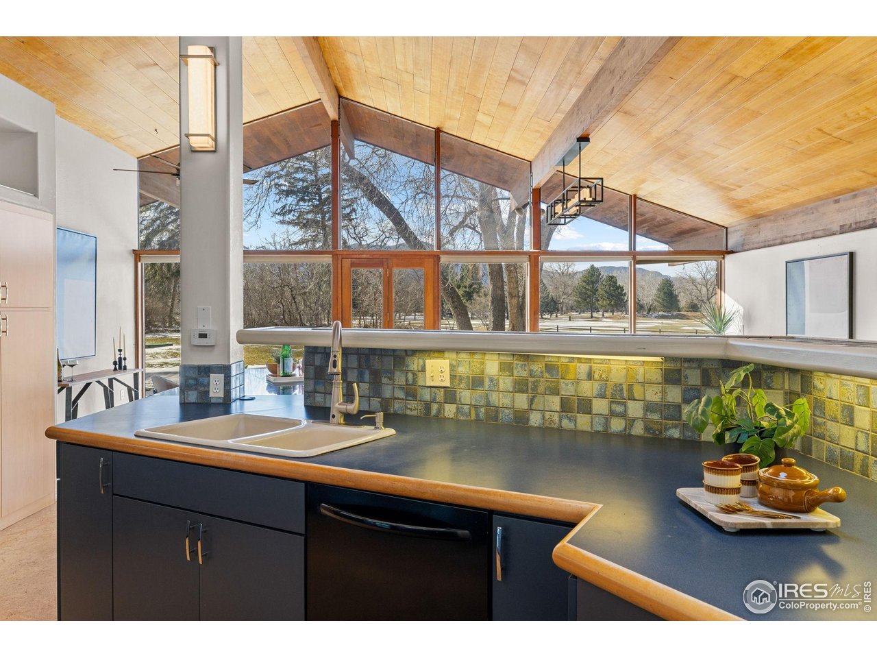 1193 Old Tale Road Boulder, CO 80303 - Photo 27 of 50 a bathroom with a sink and a window
