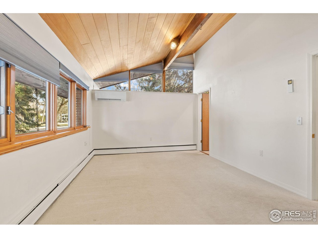1193 Old Tale Road Boulder, CO 80303 - Photo 35 of 50 a view of an empty room with a window