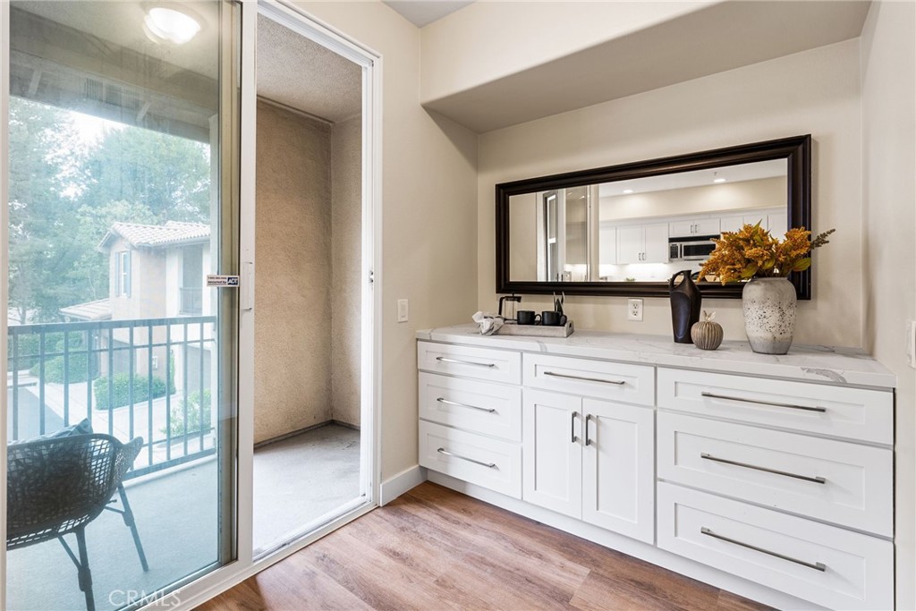 61 Stepping Stone Irvine, CA 92603 - Photo 13 of 24 a bathroom with a double vanity sink and mirror