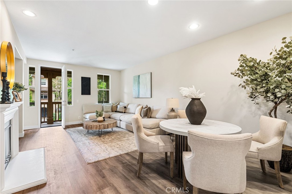 61 Stepping Stone Irvine, CA 92603 - Photo 4 of 24 a living room with furniture and a table