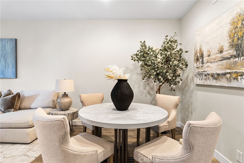 61 Stepping Stone Irvine, CA 92603 - Photo 6 of 24 a bathroom with a toilet a sink and a mirror