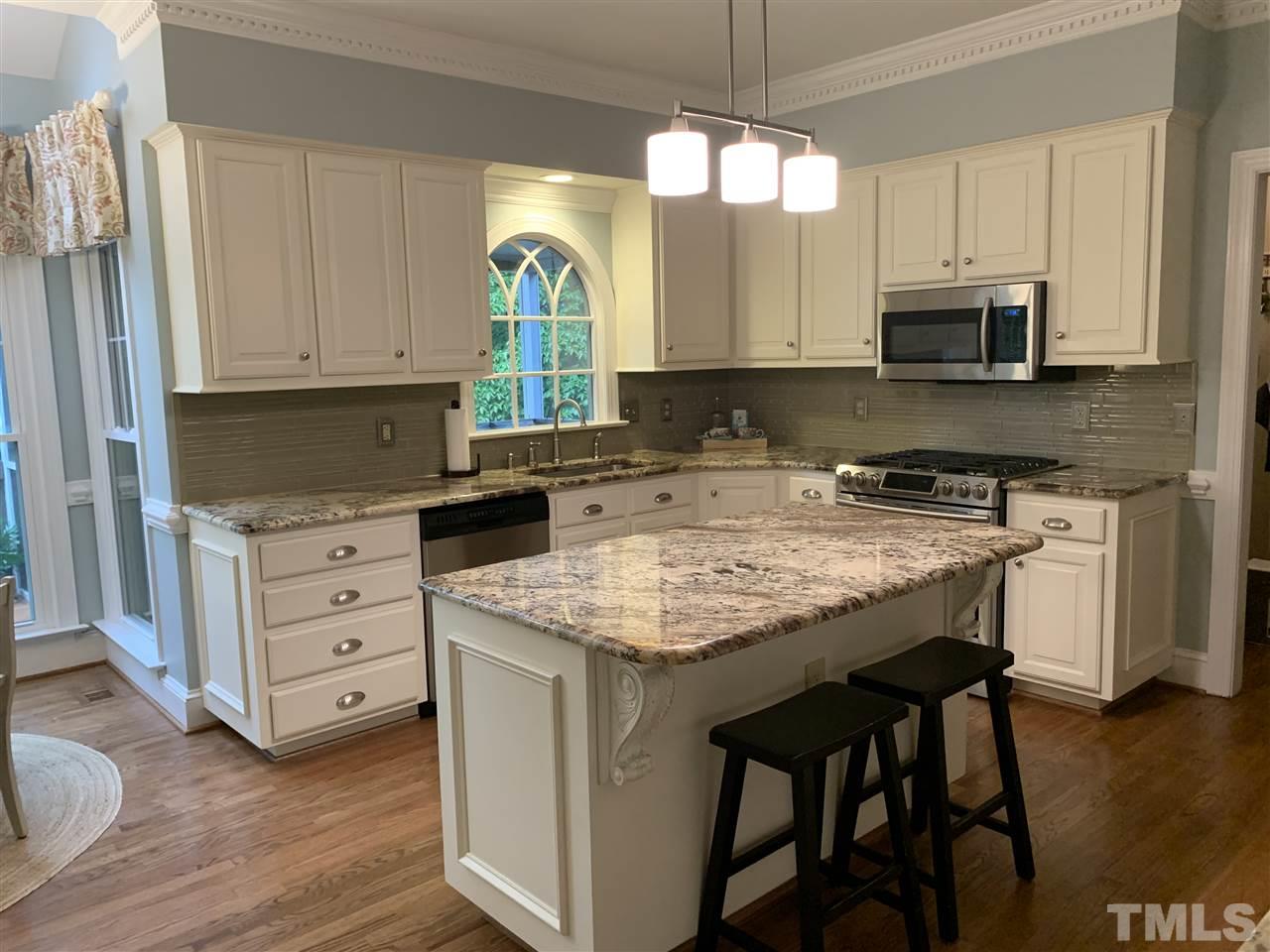 7907 Sandy Bottom Way Raleigh, NC 27613 - Photo 3 of 20 Large island is perfect for gatherings!