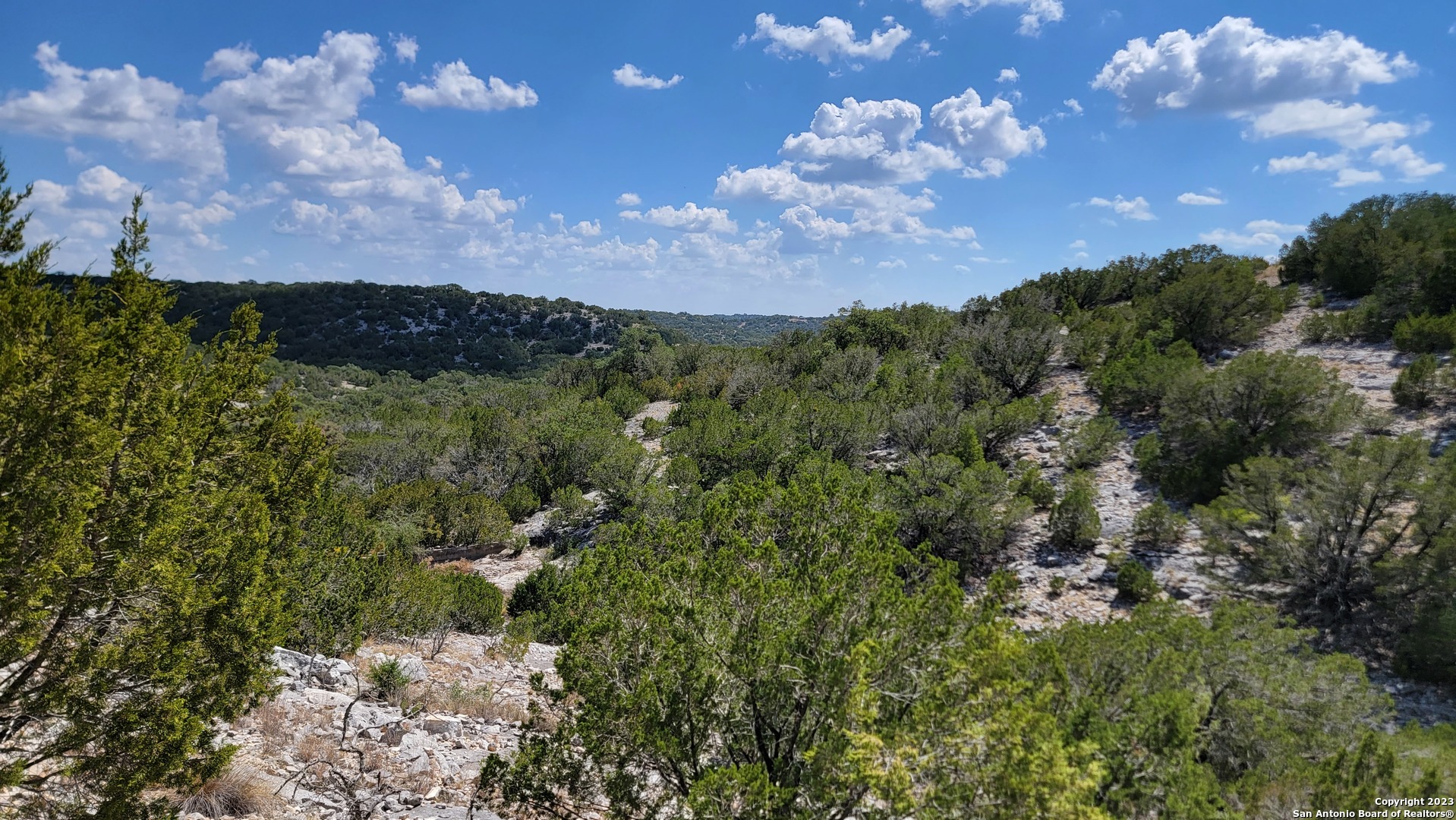 0 Stagecoach Rocksprings, TX 78880 - Photo 7 of 24 a view of a city with lots of bushes