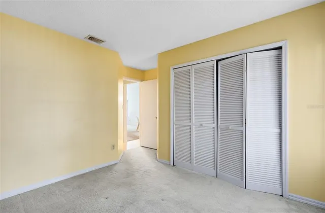 an empty room with closet