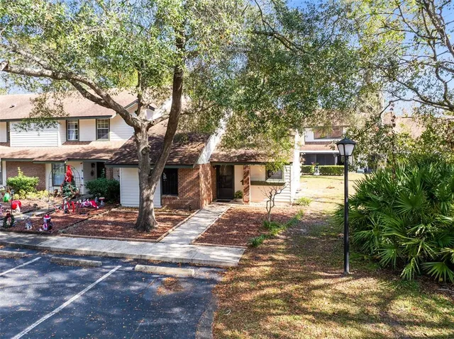 a house with trees in front of it