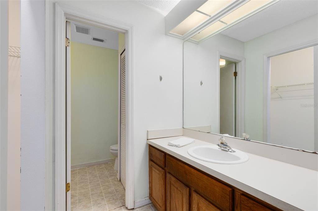 165 Post Way Casselberry, FL 32707 - Photo 4 of 22 a bathroom with a sink and a mirror