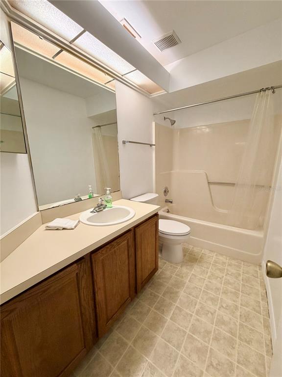 165 Post Way Casselberry, FL 32707 - Photo 7 of 22 a bathroom with a double vanity sink mirror and toilet