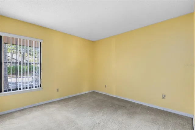 a view of a big room with windows