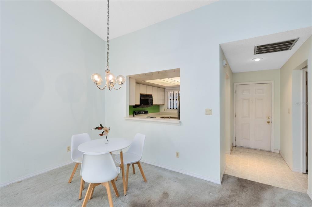 165 Post Way Casselberry, FL 32707 - Photo 9 of 22 a view of a dining room with furniture and wooden floor