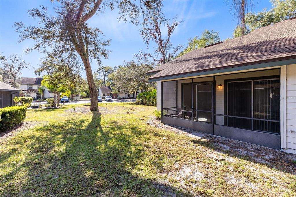 165 Post Way Casselberry, FL 32707 - Photo 10 of 22 a view of a backyard with large trees