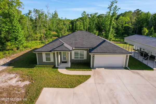 front view of a house with yard