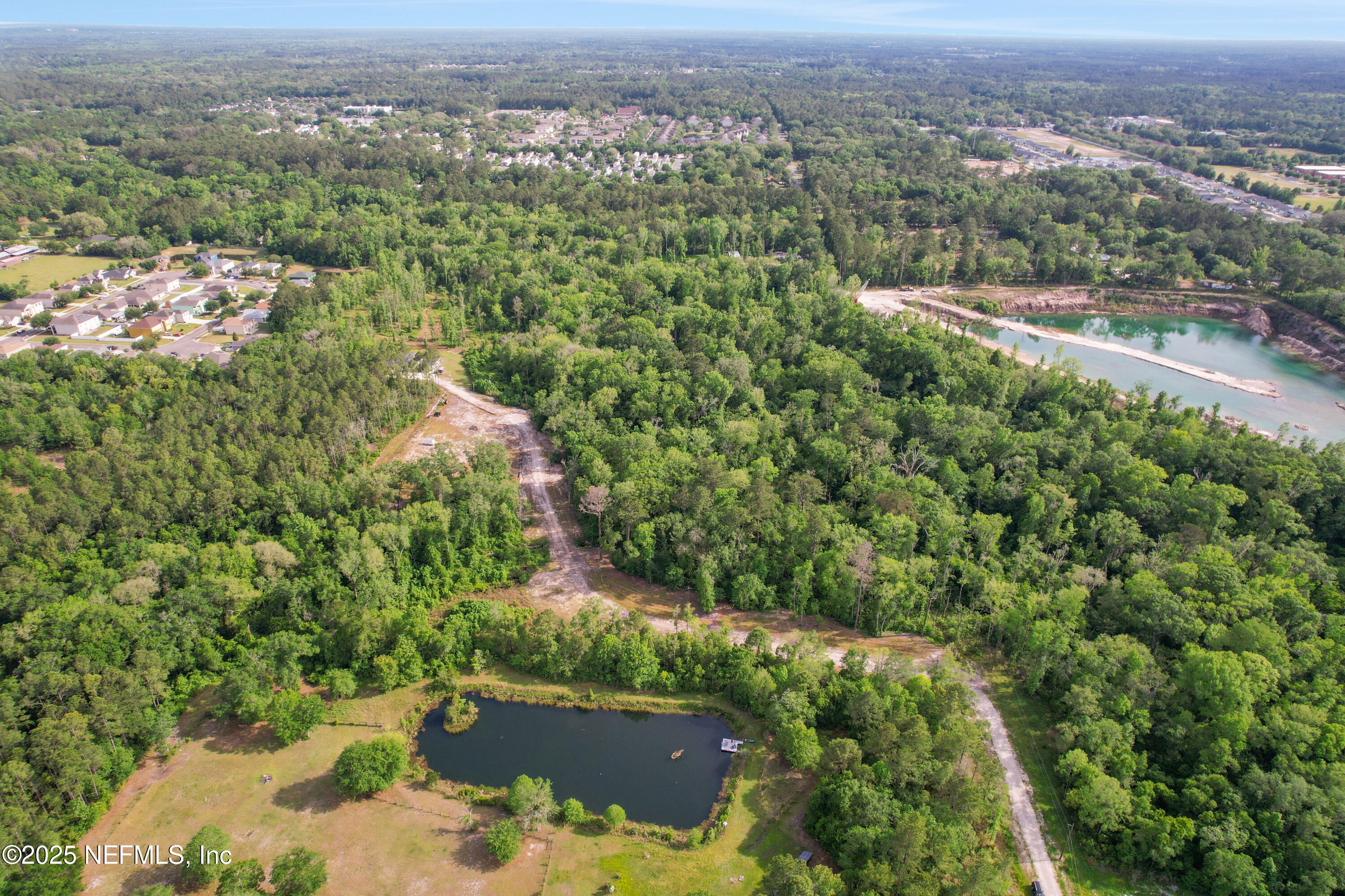 4467 Monroe Smith Road Jacksonville, FL 32210 - Photo 42 of 61 an aerial view of a house with a yard
