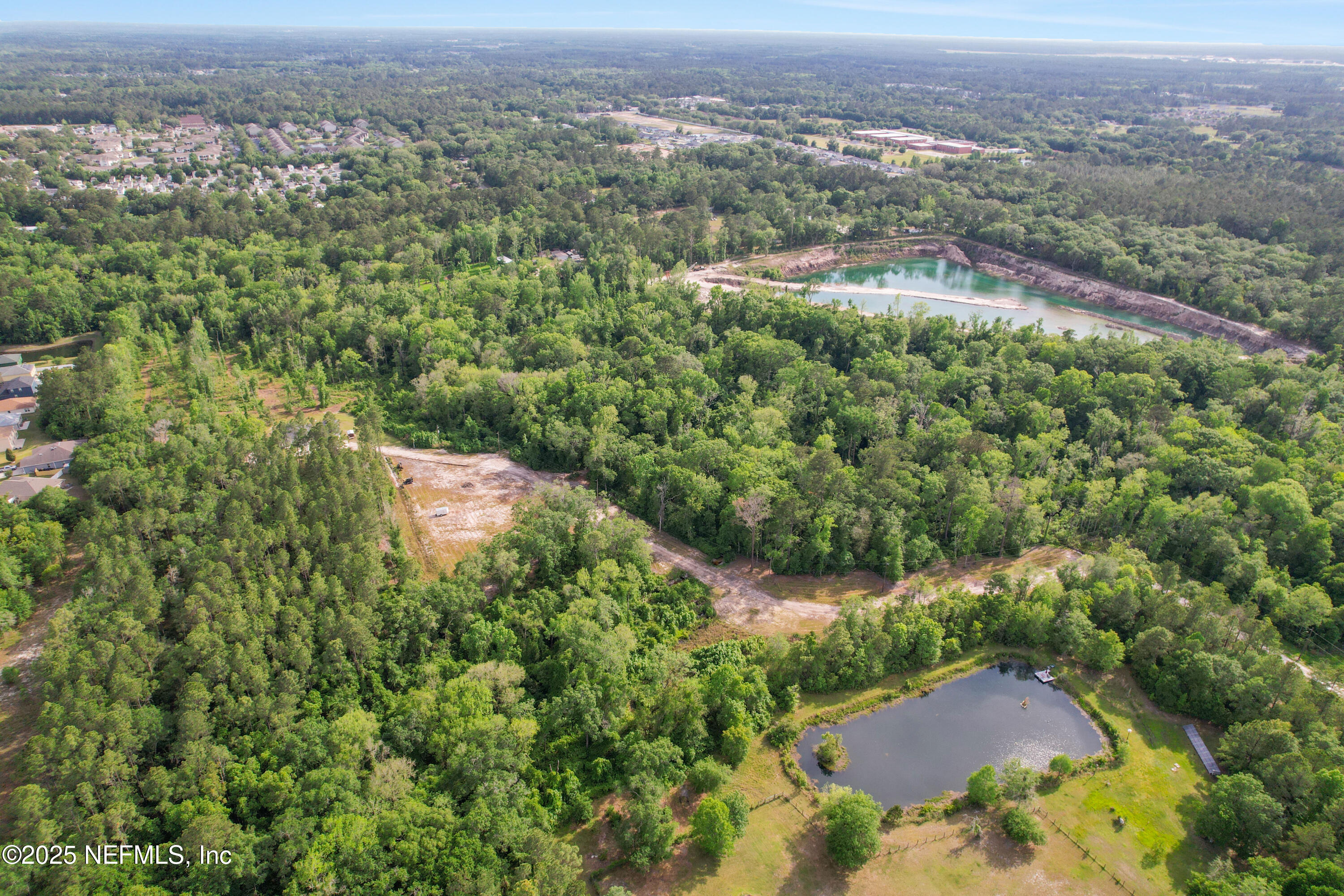 4467 Monroe Smith Road Jacksonville, FL 32210 - Photo 43 of 61 an aerial view of a house with a yard