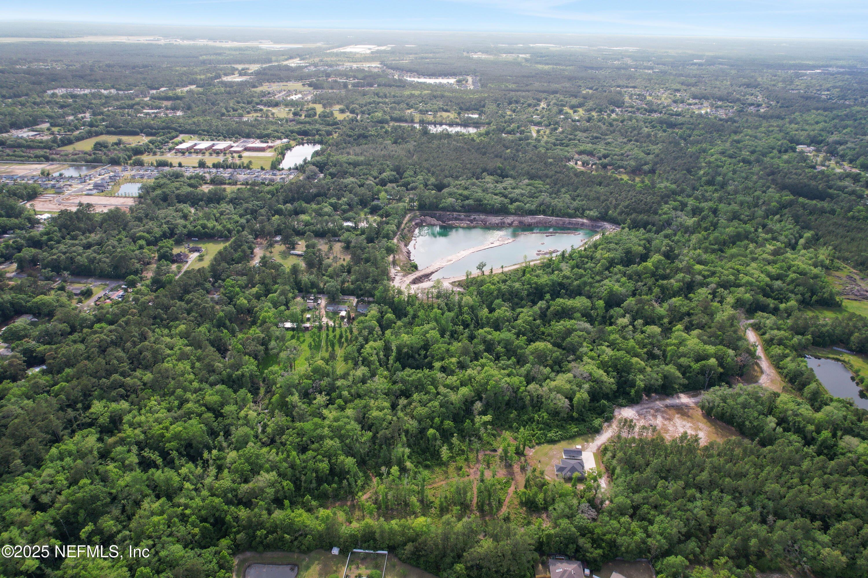 4467 Monroe Smith Road Jacksonville, FL 32210 - Photo 45 of 61 an aerial view of residential house with green space