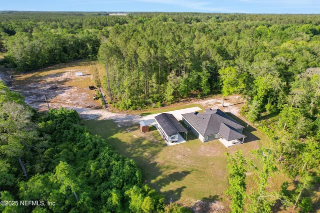 a view of a yard with an outdoor space