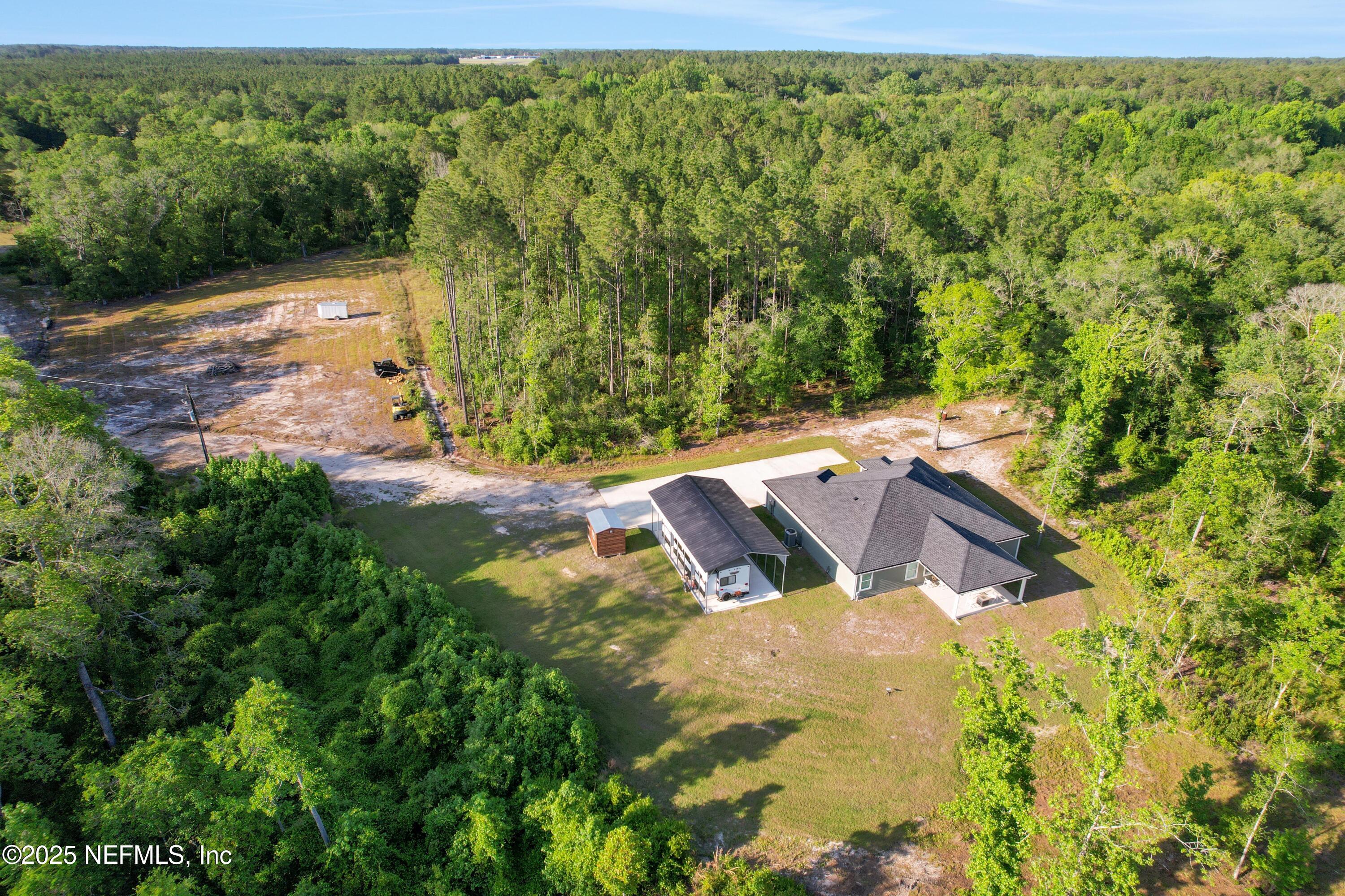 4467 Monroe Smith Road Jacksonville, FL 32210 - Photo 10 of 61 a view of backyard with swimming pool and outdoor space