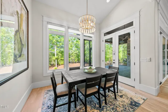 a kitchen with sink refrigerator and microwave