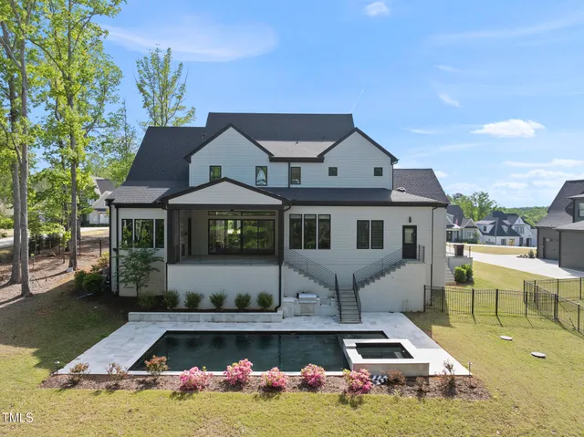a outdoor space with patio the couches and a fireplace